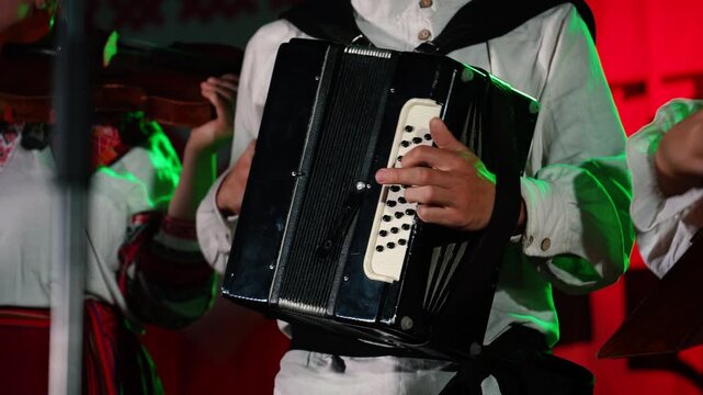Playing a small accordion