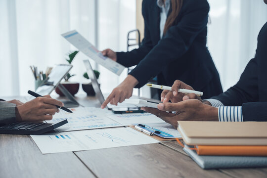 Accounting company provide finance and taxation planning for profitable cash flow, Auditor and accountant team working in office, analyze financial data and accounting record with calculator.Insight