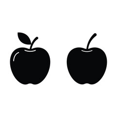 Two black apples with stems on a white background