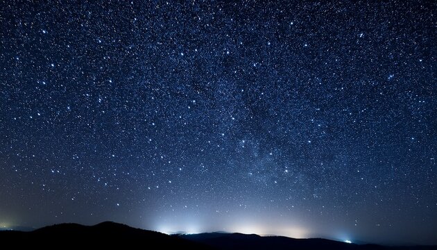 starry night sky with twinkling stars on a dark background