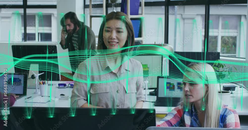 Poster women clicking and pointing at monitor to review data, causing green waveform and volume flickering