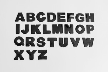 Black alphabet letters on white background