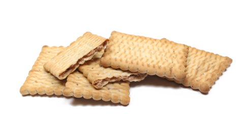 Broken rectangular double color biscuit and crumbs, pile cookies isolated on white, side view