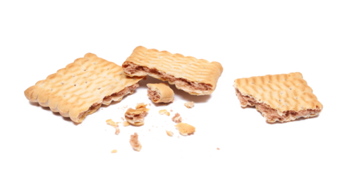 Broken rectangular double color biscuit and crumbs, pile cookies isolated on white, side view