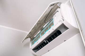 Low angle view of new air conditioner unit in living room