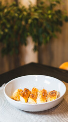 Crispy golden fried cassava sticks seasoned with aromatic spices and chili peppers. A perfect savory snack, ideal for Brazilian cuisine themes, street food, and appetizer menus.