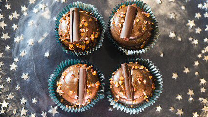 Beautiful assorted chocolate cupcakes with creamy frosting and colorful toppings, styled on a chic plate. Ideal for dessert content, baking inspiration, and joyful food storytelling.