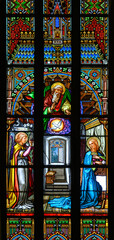 The Annunciation (to the Virgin Mary by Gabriel the Archangel). A stained-glass window in St...