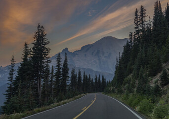 road in Mount Rainier National Park at sunset 