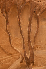 Close-up of water marks on a rock formation in the South Arabian Desert, Saudi Arabia. Rainbow Rock in AlUla, Saudi Arabia