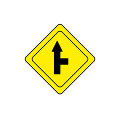 Yellow diamond-shaped road warning sign showing a straight road with a T-intersection from the right. Indicates a side road joins from the right side