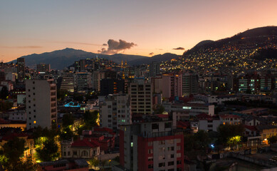 Panoramic view of the northern part of Quito during the evening with the buildings lit up