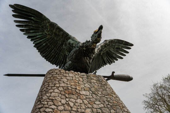 Tatabanya, Hungary - April 1, 2024: Huge turul bird statue in Tatabanya on cloudy day.