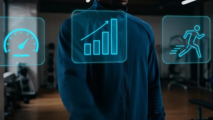 An adult man in a modern gym engages with futuristic fitness tracking data on a holographic display to monitor his performance and athletic progress. - Powered by Adobe