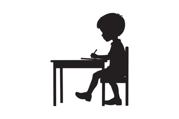 Fototapeta premium Silhouette of a child studying at a desk
