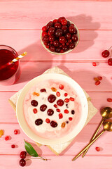 Healthy breakfast with ingredients. Cherry yogurt with pomegranate, cherry, raisin and juice on wooden table, fruit salad, detox diet and natural nutrition concept, Healthy lifestyle advertising