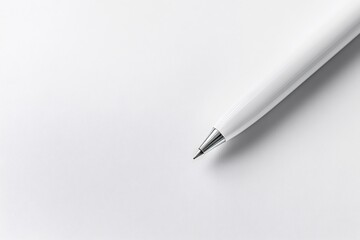 Minimalist close up of a stylish white pen lying on a pristine white paper, ready for writing or drawing