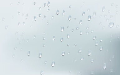 Rain transparent drops flow down the glass.Realistic wet condensation texture.