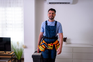 Handyman ready for household repairs in comfortable indoor setting during day