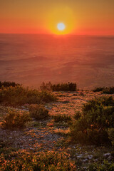 Sunrise from the top of Mount Alaric in the Aude. View from the top of a mountain in the South of France over the Occitanie plain.