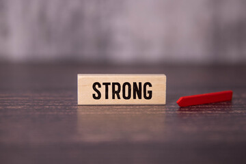 Stronger Together, text on notepad. on a white background near the stationery.