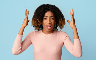 Oh No. Upset African American Lady Raising Hands And Looking At Camera With Sorrow, Unhappy Black...