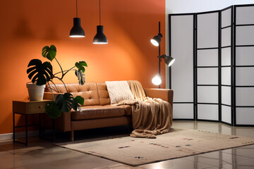 Interior of living room with brown sofa, palm plant and glowing lamps