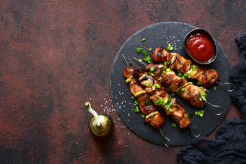Roasted chicken skewer kebab. Top view with copy space.