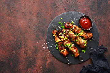 Roasted chicken skewer kebab. Top view with copy space.