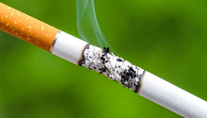 Burning Cigarette with Green Background.