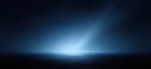 Dark blue backdrop with a bright light source emanating from the bottom center, creating a hazy, atmospheric effect, ideal for presentations or moody designs