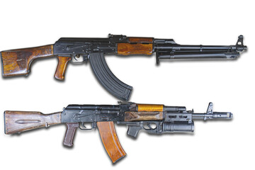 Image shows two rifles with wooden stocks, one horizontally oriented darker wood, matte finish, the...