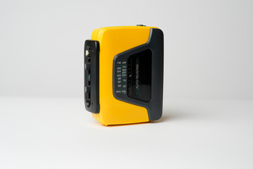 Retro cassette player with earbuds, 1990s