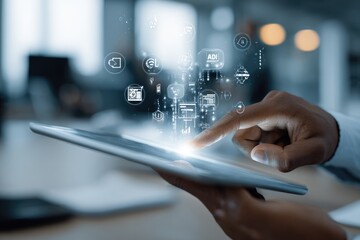 Close-up of a person's hand interacting with a tablet, displaying digital icons and data visualizations.  Modern, business-related interface