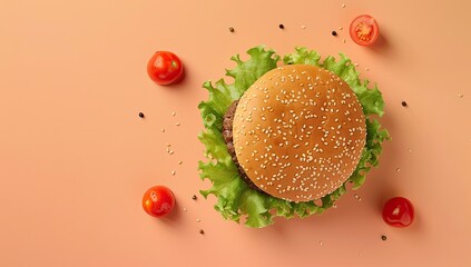 Overhead juicy burger, lettuce, tomato, pepper, sesame seeds, peach background; food menu