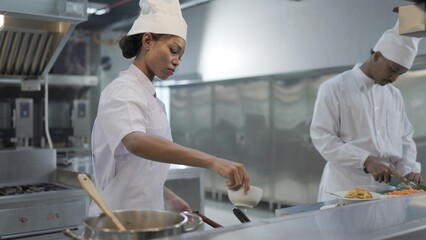 chef preparing food in kitchen
