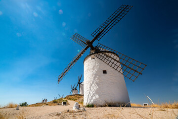 Iconic Windmills of Consuegra, Spain Beneath the Summer Sky