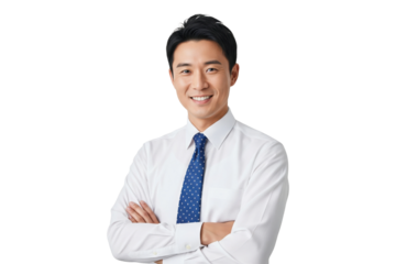 Portrait of a friendly young Asian businessman smiling with arms crossed.