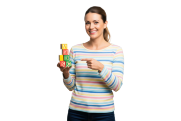 Smiling woman pointing to a stack of ABC alphabet blocks for early education concepts.
