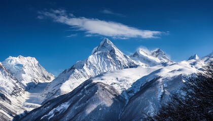 Obraz premium snowy mountain peaks under blue sky