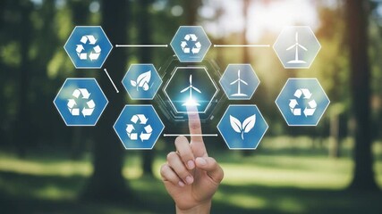 Hand touching ecology icons with wind turbines and recycle symbol in a forest background view - Powered by Adobe