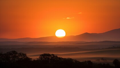 Fototapeta premium stunning sunset scene in golden yellow and orange colors sun disappearing in haze modern illustration