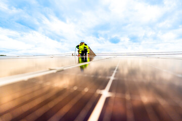 close up on grid of technology renewable solar energy. construction solar panels system on roof....