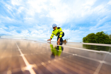 engineer man inspects construction of solar cell panel or photovoltaic cell by electronic device....