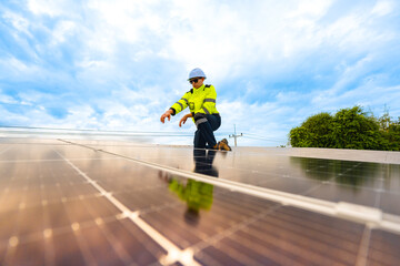 close up on grid of technology renewable solar energy. construction solar panels system on roof....