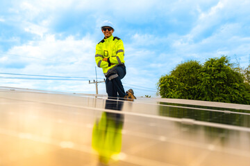 close up on grid of technology renewable solar energy. construction solar panels system on roof....