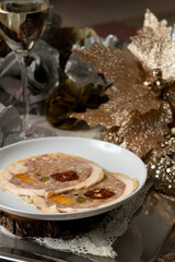 Chicken and Pork Terrine with Pine Nuts, Pickles and Prunes on Silver Platter – Elegant Christmas Dining Scene
