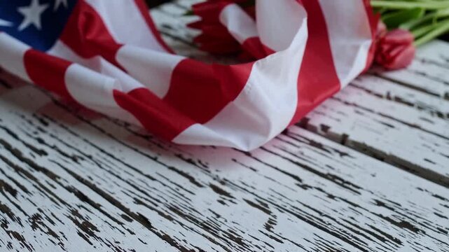 memorial day american flag white wooden table tulips close up old retro red great veterans labor commemoration banner pale timber desk 