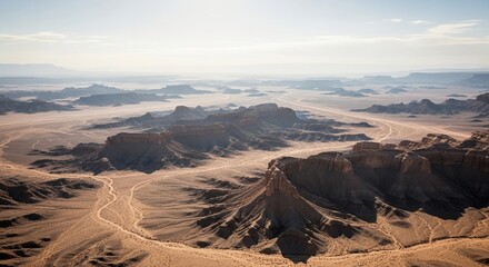 Aerial View of Desert Landscape with Mountains and Haze.