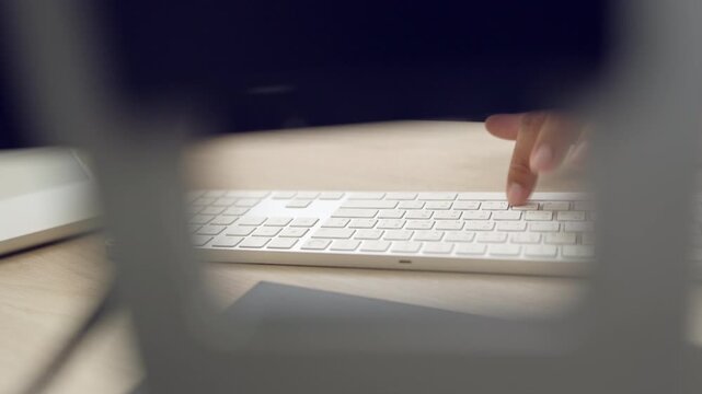 Asian woman typing on keyboard while creating content for online blog or article, representing creativity, media, and digital publishing.
